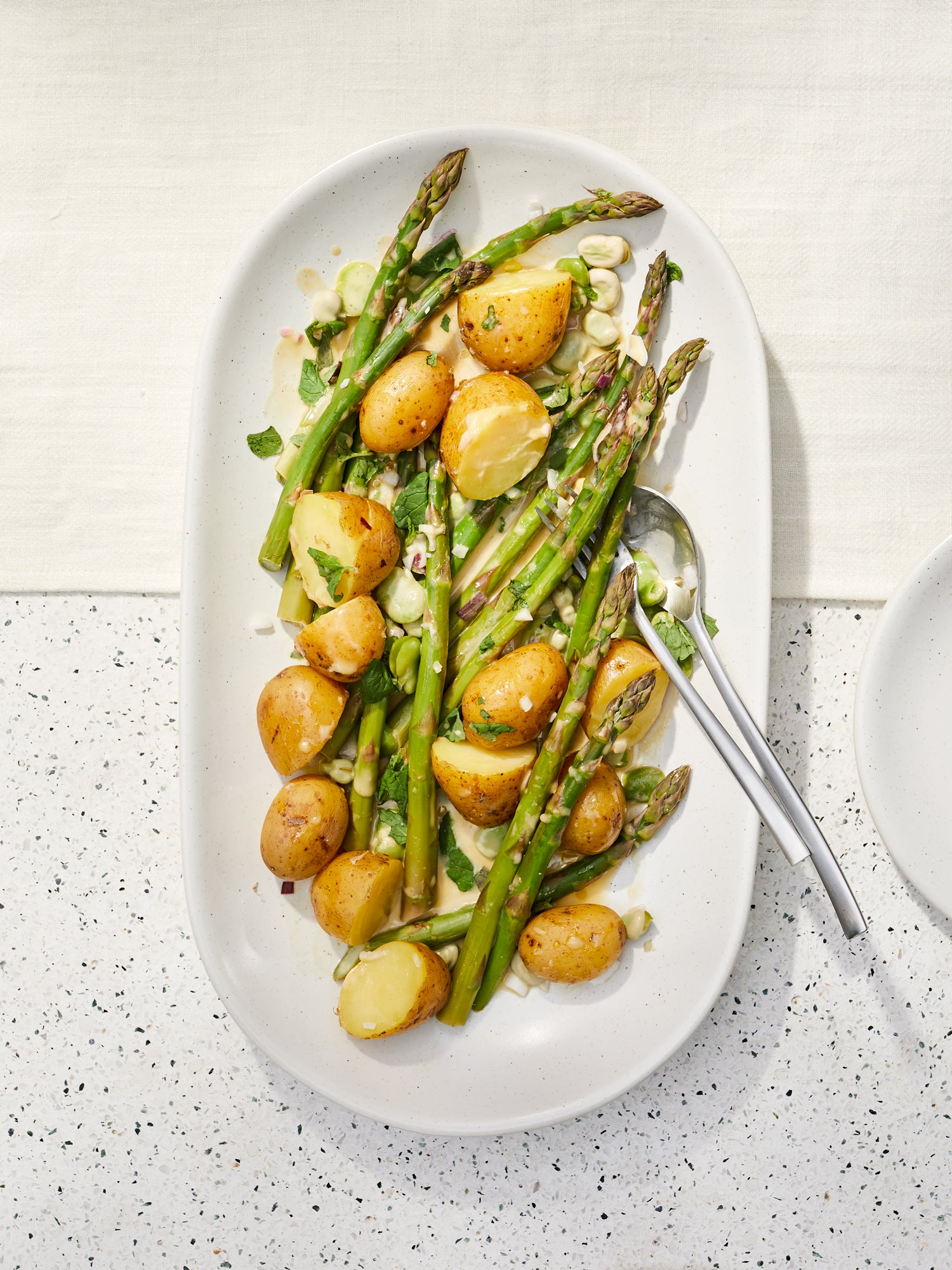 New potato, mint, broad beans and asparagus salad with anchovy